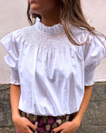 Blusa abullonada blanca