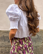 Blusa abullonada blanca
