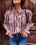 Blusa estampada holgada beige