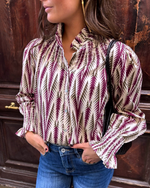 Blusa estampada holgada beige