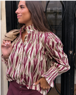 Blusa estampada holgada beige