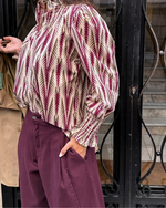 Blusa estampada holgada beige