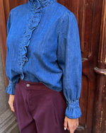 Blusa vaquera de cuello ancho