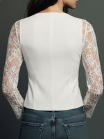 Blazer negro con mangas semitransparentes