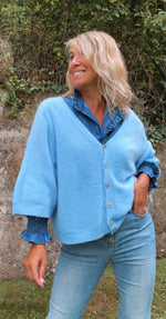 Chaqueta de punto azul celeste