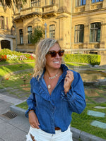 Blusa vaquera de cuello ancho