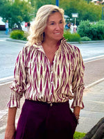 Blusa estampada holgada beige