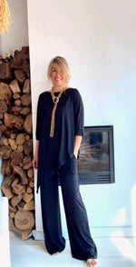 Pantalón ancho de tiro alto negro