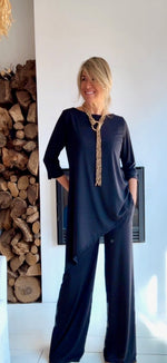 Lucía · Pantalón ancho de tiro alto negro