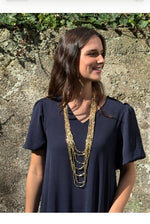 Aura · Collar multicadena dorado
