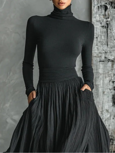 Conjunto de falda plisada y camiseta de cuello alto negro