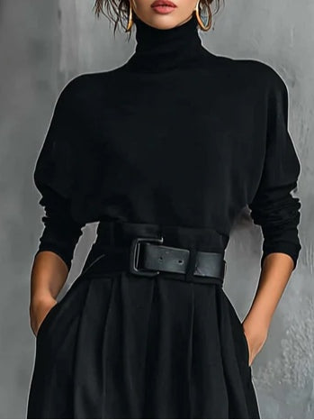 Conjunto de top de cuello alto negro y pantalón recto