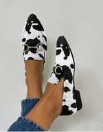 Mocasines estampados con hebilla