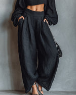 Conjunto de hombros descubiertos y pantalón