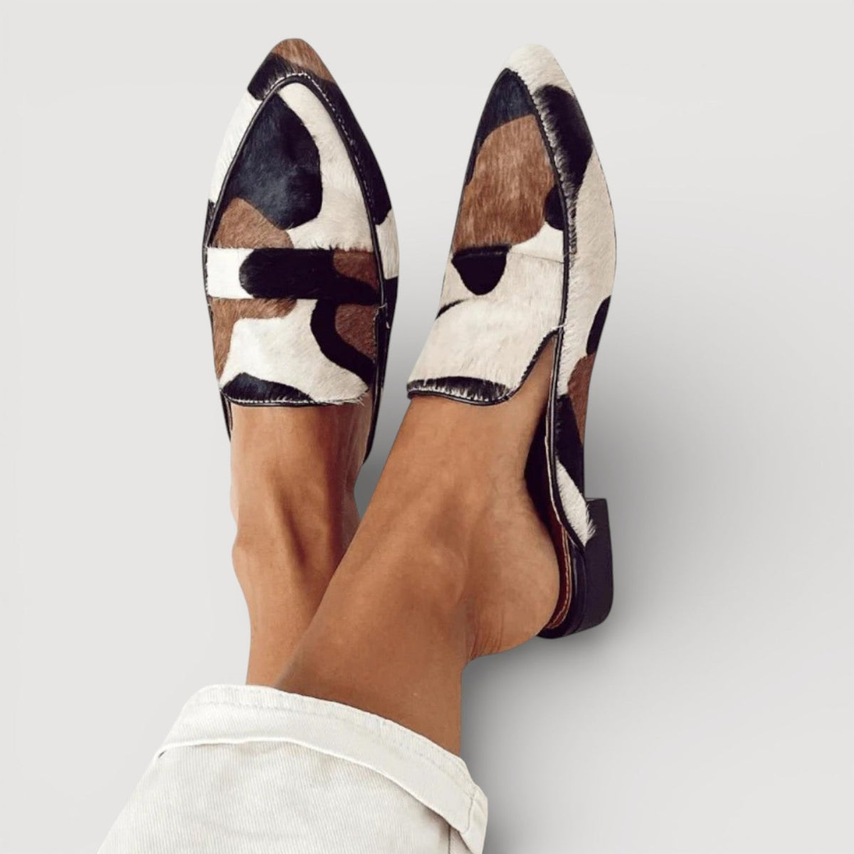 Amanda · Mocasines con estampado vaca